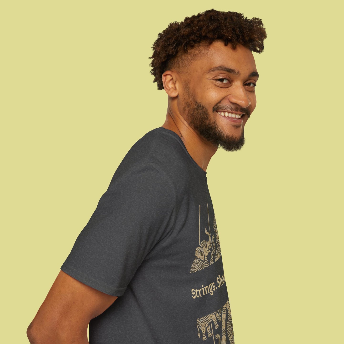 Cultural Graphic T-Shirt – Strings. Shadows. Stories.